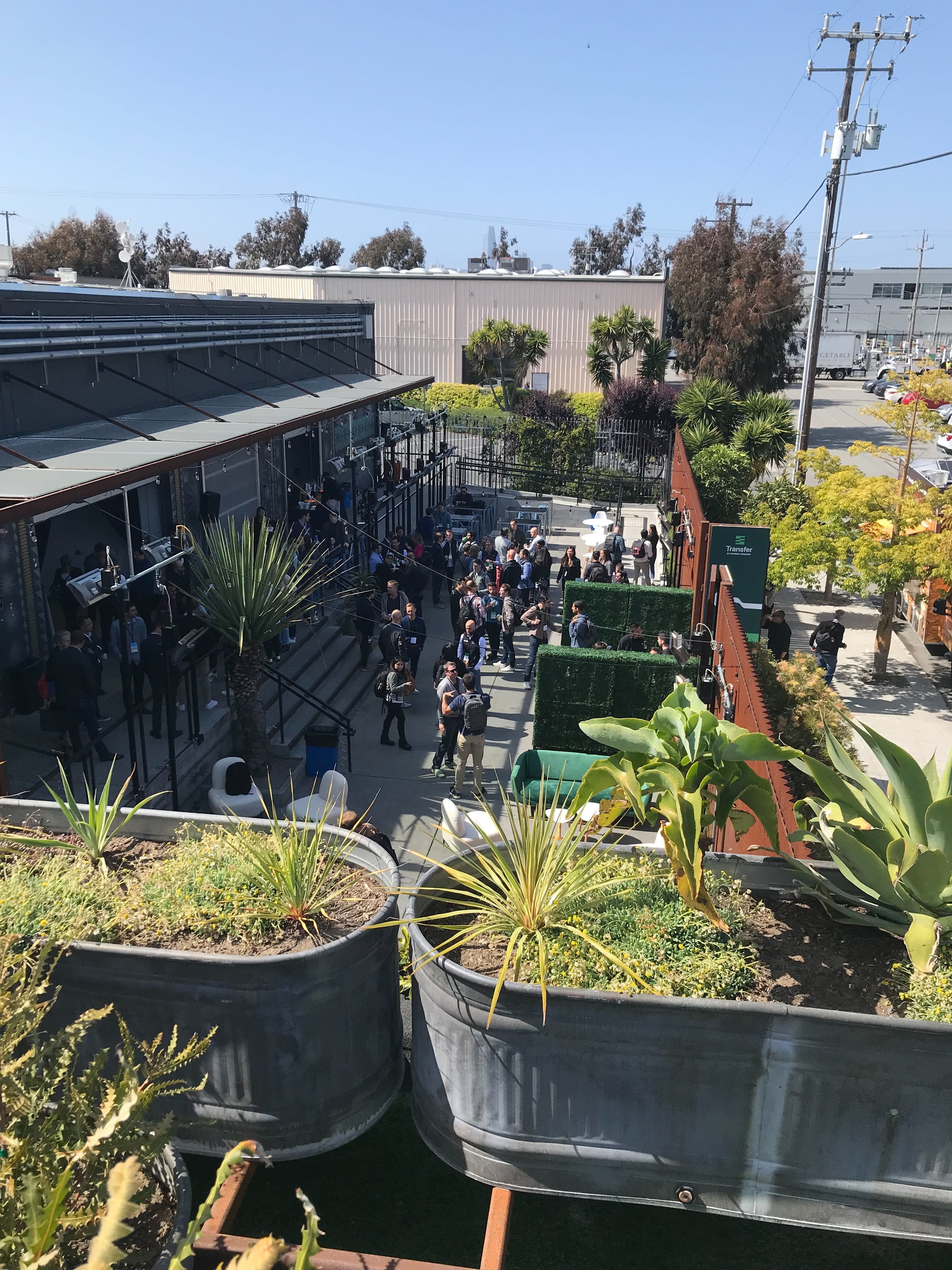 Transfer attendees post-show chatting outside the Midway